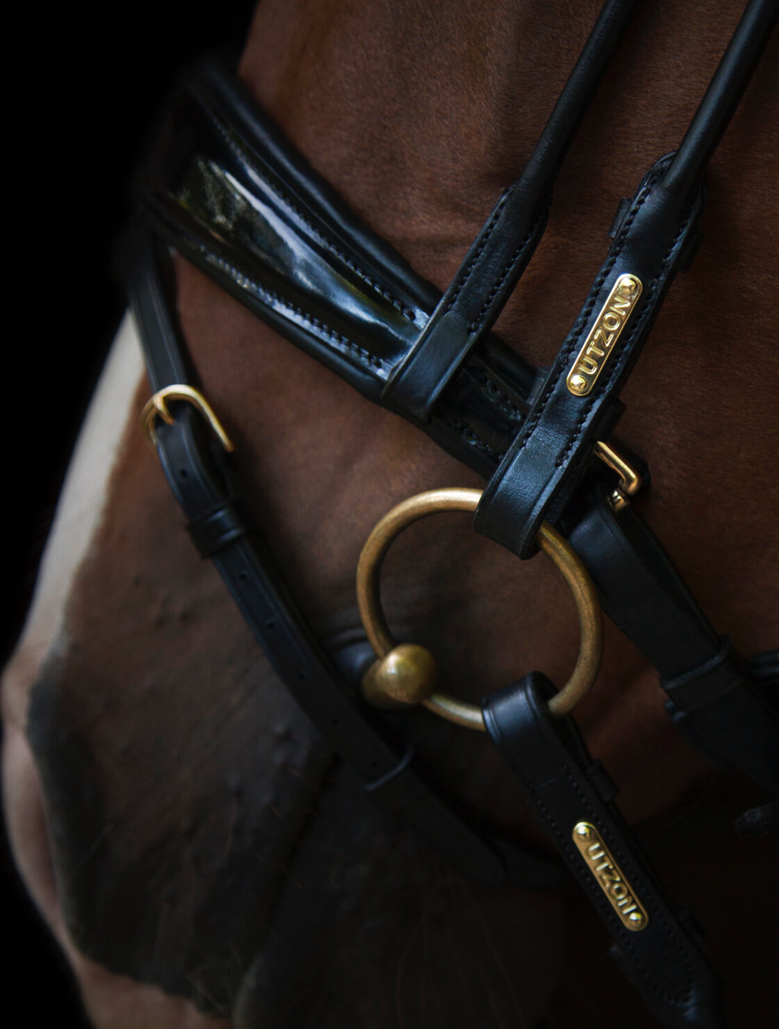 Utzon Copenhagen bridle in black and brass metalware
