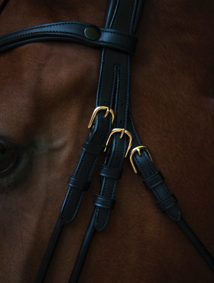 Utzon Copenhagen bridle in black and gold metalware